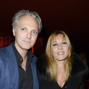 Mathilde Seigner et son compagnon Mathieu Petit - 100e du spectacle "Mugler Follies" au Théâtre le Comédia à Paris le 26 mai 2014.