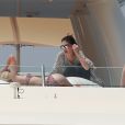 Exclusif - Melanie Griffith en bikini noir sur un yacht lors de ses vacances à Ibiza le 4 juillet 2019.  Exclusive - For Germany please call for price Actress Melanie Griffith during holidays in Ibiza on Thursday 04 July 2019.04/07/2019 - Ibiza