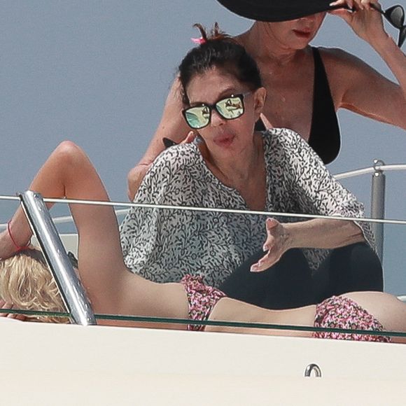 Exclusif - Melanie Griffith en bikini noir sur un yacht lors de ses vacances à Ibiza le 4 juillet 2019.