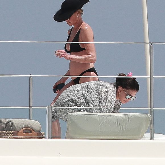 Exclusif - Melanie Griffith en bikini noir sur un yacht lors de ses vacances à Ibiza le 4 juillet 2019.