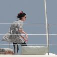 Exclusif - Melanie Griffith en bikini noir sur un yacht lors de ses vacances à Ibiza le 4 juillet 2019.