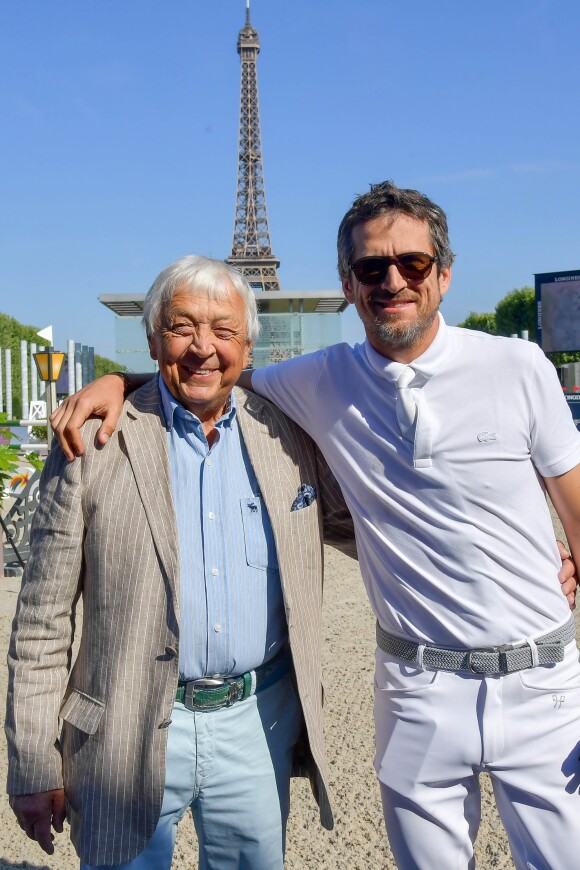 Exclusif - Guillaume Canet et son père Philippe lors du Longines Paris Eiffel Jumping au Champ de Mars à Paris, France, le 7 juillet 2019. © Pierre Perusseau/Bestimage