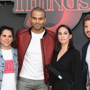 Tony Parker avec sa femme Axelle Francine et guest à la première de la série Netflix "Stranger Things - Saison 3" au cinéma Le Grand Rex à Paris, le 4 juillet 2019. © Guirec Coadic/Bestimage