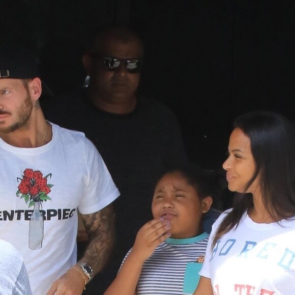 Matt Pokora, sa compagne Christina Milian enceinte et sa fille Violet Nash - Enceinte et radieuse, C.Milian se rend au glacier McConnell avec compagnon M.Pokora et sa fille V.Nash pour le goûter après avoir acheté des vêtements pour bébés. La chanteuse 'Dip it Low' et son compagnon ont annoncé sa grossesse la semaine dernière via Instagram. C'est le premier enfant du couple et le premier enfant de M.Pokora. Los Angeles, le 3 août 2019.