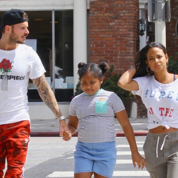 Matt Pokora, sa compagne Christina Milian enceinte et sa fille Violet Nash - Enceinte et radieuse, C.Milian se rend au glacier McConnell avec compagnon M.Pokora et sa fille V.Nash pour le goûter après avoir acheté des vêtements pour bébés. La chanteuse 'Dip it Low' et son compagnon ont annoncé sa grossesse la semaine dernière via Instagram. C'est le premier enfant du couple et le premier enfant de M.Pokora. Los Angeles, le 3 août 2019.