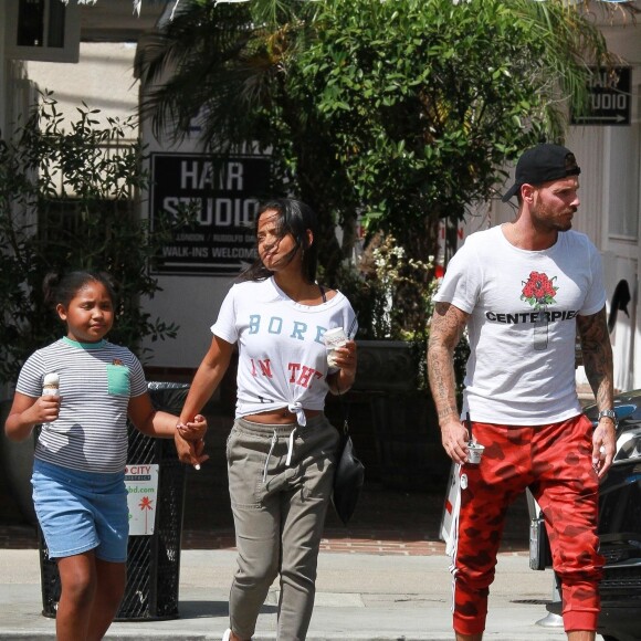 Matt Pokora, sa compagne Christina Milian enceinte et sa fille Violet Nash - Enceinte et radieuse, C.Milian se rend au glacier McConnell avec compagnon M.Pokora et sa fille V.Nash pour le goûter après avoir acheté des vêtements pour bébés. La chanteuse 'Dip it Low' et son compagnon ont annoncé sa grossesse la semaine dernière via Instagram. C'est le premier enfant du couple et le premier enfant de M.Pokora. Los Angeles, le 3 août 2019.