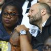 Claudia Tagbo et son compagnon dans les tribunes lors du match de championnat de Ligue 1 Conforama opposant le Paris Saint-Germain au Nîmes Olympique au parc des Princes à Paris, France, le 11 août 2019. Le PSG a gagné 3-0. © Gwendoline Le Goff/Panoramic/Bestimage