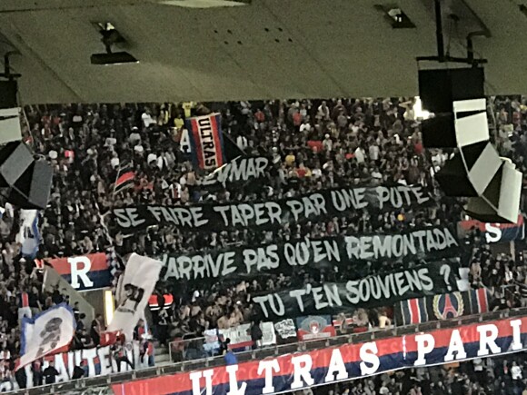 Banderole à l'intention de Neymar lors de la rencontre PSG - Nîmes au Parc des Princes le 11 Août 2019 à Paris . On pouvait lire "Neymar, se faire taper par une pute, n'arrive pas qu'en remontada, tu t'en souviens ?"