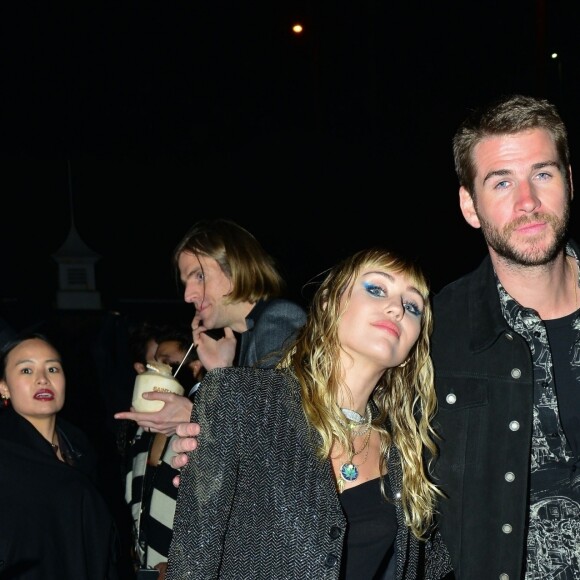 Miley Cyrus et son mari Liam Hemsworth ont été aperçus à la sortie du défilé Saint Laurent à Malibu, le 6 juin 2019.