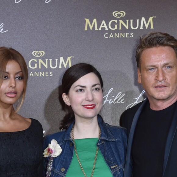 Zahia Dehar, la réalisatrice Rebecca Zlotowski et Benoît Magimel lors de la soirée du film "Une Fille Facile" sur la plage privée Magnum lors du 72ème Festival International du Film de Cannes, France, le 20 mai 2019. © Giancrlo Gorassini/Bestimage