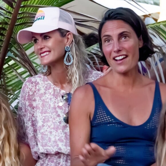 Exclusif - Carole Gruson (la grande prêtresse du restaurant cabaret burlesque "Le Ti' St Barth"), Laeticia Hallyday et Alessandra Sublet lors du St-Barth Family Festival 2019 à l'hôtel Manapany sur l'île de Saint-Barthélemy, Antilles française, France, le 8 août 2019. © Xavier Merchet-Thau/PhotoStBarth/Bestimage