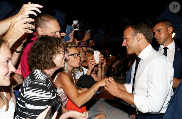 Emmanuel Macron, président de la République Française, prend un bain de foule à l'issue des commémorations du 75ème anniversaire de la libération de la ville de Bormes-les-Mimosas, lors du débarquement de Provence. Bormes-les-Mimosas, le 17 août 2019. © Dominique Jacovides/Bestimage