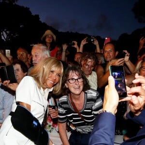 La Première dame Brigitte Macron (avec une attelle au bras droit), prend un bain de foule à l'issue des commémorations du 75ème anniversaire de la libération de la ville de Bormes-les-Mimosas, lors du débarquement de Provence. Bormes-les-Mimosas, le 17 août 2019. © Dominique Jacovides/Bestimage