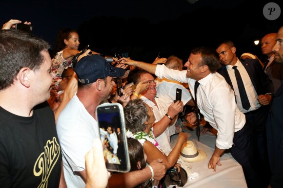 Emmanuel Macron, président de la République Française, prend un bain de foule à l'issue des commémorations du 75ème anniversaire de la libération de la ville de Bormes-les-Mimosas, lors du débarquement de Provence. Bormes-les-Mimosas, le 17 août 2019. © Dominique Jacovides/Bestimage