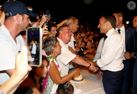 Emmanuel Macron, président de la République Française, prend un bain de foule à l'issue des commémorations du 75ème anniversaire de la libération de la ville de Bormes-les-Mimosas, lors du débarquement de Provence. Bormes-les-Mimosas, le 17 août 2019. © Dominique Jacovides/Bestimage
