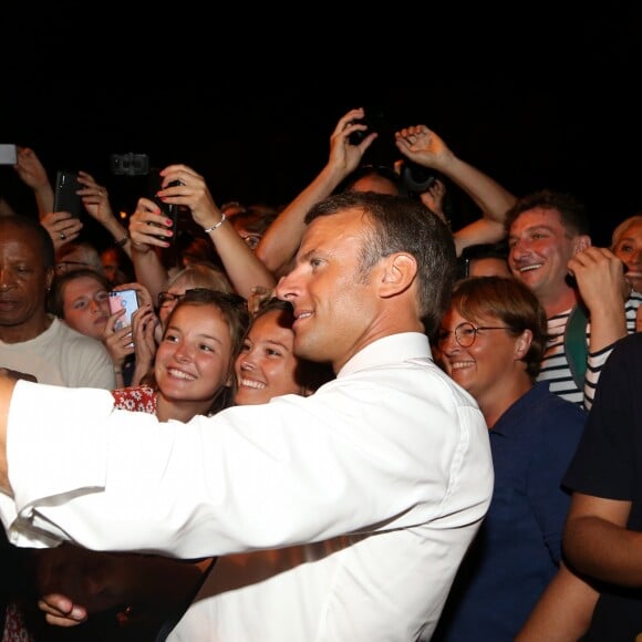 Emmanuel Macron, président de la République Française, prend un bain de foule à l'issue des commémorations du 75ème anniversaire de la libération de la ville de Bormes-les-Mimosas, lors du débarquement de Provence. Bormes-les-Mimosas, le 17 août 2019. © Dominique Jacovides/Bestimage