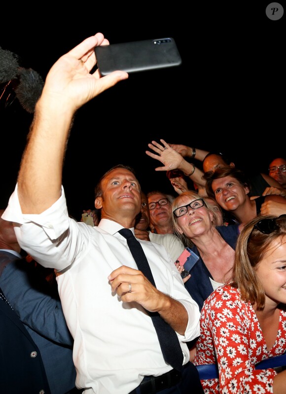 Emmanuel Macron, président de la République Française, prend un bain de foule à l'issue des commémorations du 75ème anniversaire de la libération de la ville de Bormes-les-Mimosas, lors du débarquement de Provence. Bormes-les-Mimosas, le 17 août 2019. © Dominique Jacovides/Bestimage
