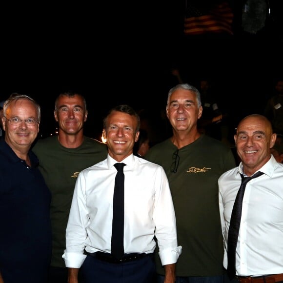 Emmanuel Macron, président de la République Française, en compagnie de François Arizzi (maire de Bormes-les-Mimosas) prend un bain de foule à l'issue des commémorations du 75ème anniversaire de la libération de la ville de Bormes-les-Mimosas, lors du débarquement de Provence. Bormes-les-Mimosas, le 17 août 2019. © Dominique Jacovides/Bestimage