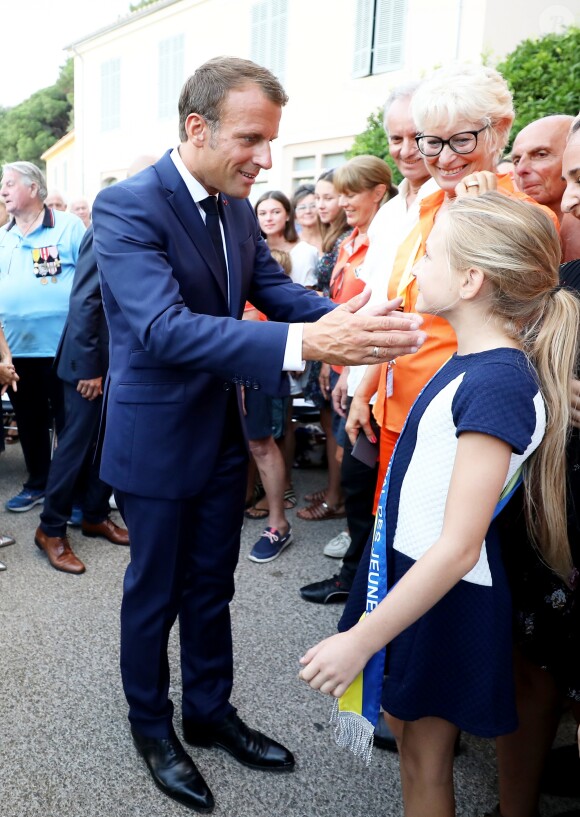 Emmanuel Macron, président de la République Française, prend un bain de foule à l'issue des commémorations du 75ème anniversaire de la libération de la ville de Bormes-les-Mimosas, lors du débarquement de Provence. Bormes-les-Mimosas, le 17 août 2019. © Dominique Jacovides/Bestimage