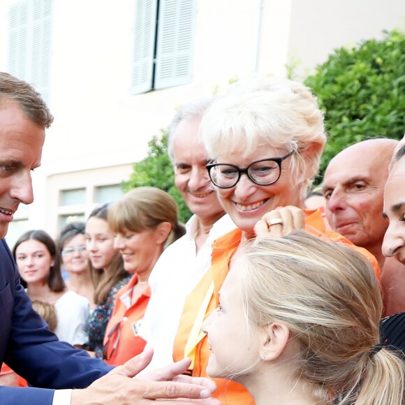 Emmanuel Macron, président de la République Française, prend un bain de foule à l'issue des commémorations du 75ème anniversaire de la libération de la ville de Bormes-les-Mimosas, lors du débarquement de Provence. Bormes-les-Mimosas, le 17 août 2019. © Dominique Jacovides/Bestimage