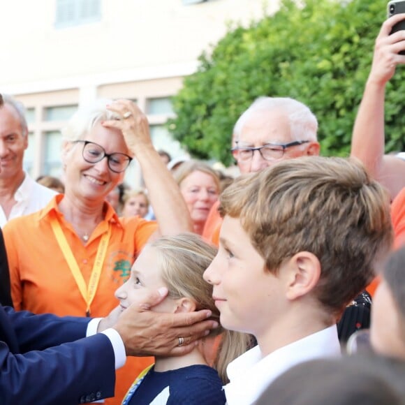 Emmanuel Macron, président de la République Française, prend un bain de foule à l'issue des commémorations du 75ème anniversaire de la libération de la ville de Bormes-les-Mimosas, lors du débarquement de Provence. Bormes-les-Mimosas, le 17 août 2019. © Dominique Jacovides/Bestimage