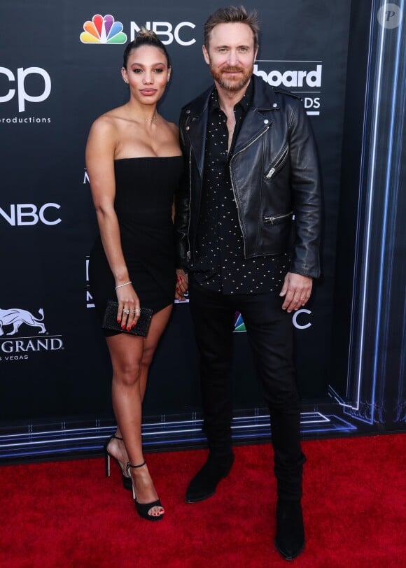 David Guetta et sa compagne Jessica Ledon à la soirée des "Billboard Music Awards 2019" au MGM Grand Garden Arena à Las Vegas. Le 1er mai 2019.
