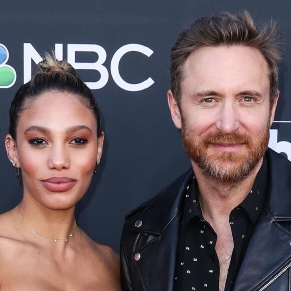 David Guetta et sa compagne Jessica Ledon à la soirée des "Billboard Music Awards 2019" au MGM Grand Garden Arena à Las Vegas. Le 1er mai 2019.