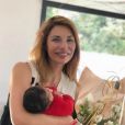 Ariane Brodier souriante, près de ses enfants - Instagram, le 26 mai 2019
