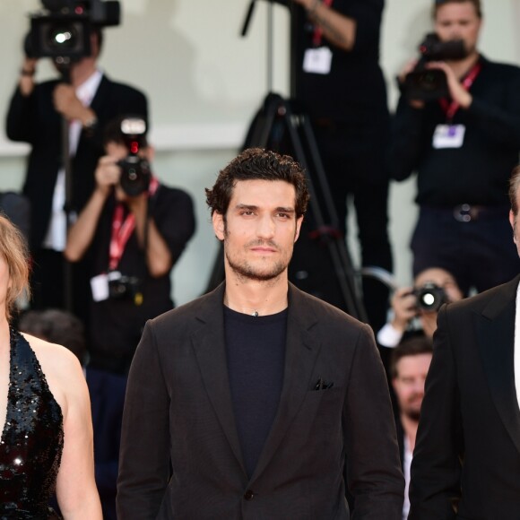 Emmanuelle Seigner, Jean Dujardin et Louis Garrel assistent à la projection du film "J'accuse !" lors du 76ème festival du film de Venise. Le 30 août 2019.