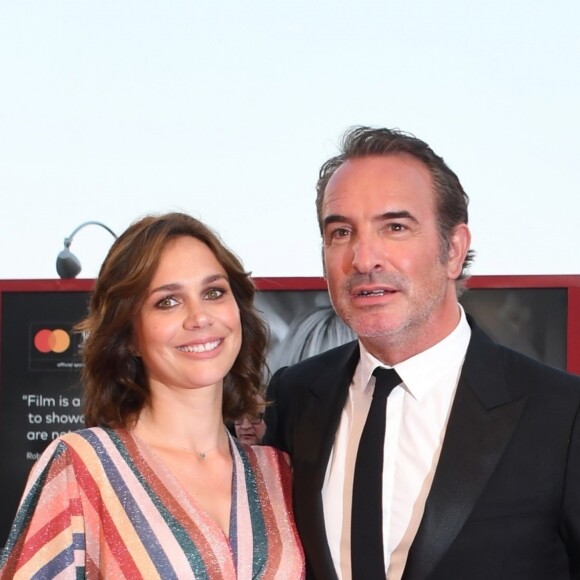 Jean Dujardin et sa femme Nathalie Péchalat lors de la projection de J'accuse ! à la 76e Mostra de Venise le 30 août 2019.