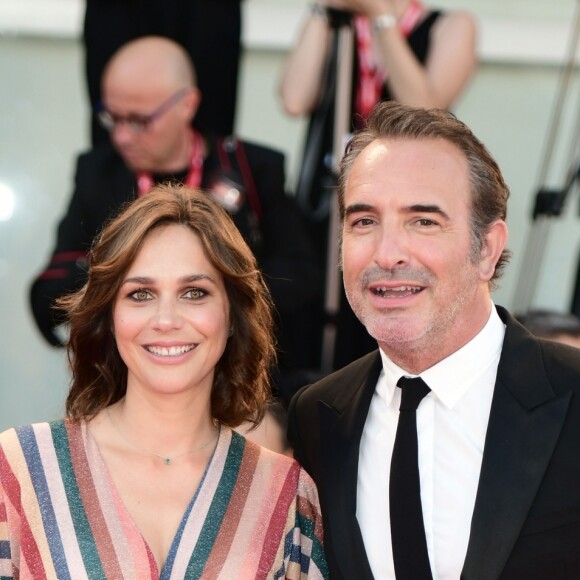 Jean Dujardin et sa femme Nathalie Péchalat lors de la projection de J'accuse ! à la 76e Mostra de Venise le 30 août 2019.