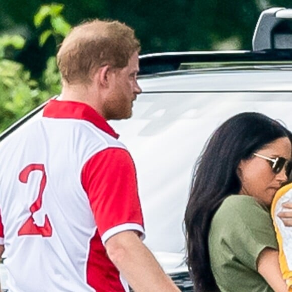 Le prince Harry, duc de Sussex, Meghan Markle, duchesse de Sussex, et leur fils Archie Mountbatten-Windsor lors d'un match de polo de bienfaisance à Wokinghan le 10 juillet 2019.