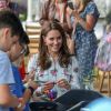 Kate Middleton, duchesse de Cambridge, vêtue d'une robe Emilia Wickstead, inaugurait le 10 septembre 2019 dans le parc botanique de Wisley une réplique de son jardin Back to Nature pour stimuler le développement des enfants.