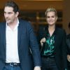 Sébastien Farran et Laeticia Hallyday sortant des locaux de TF1 à Boulogne-Billancourt le 19 octobre 2018.
