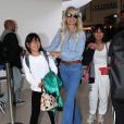 Semi-exclusif - Laeticia Hallyday et ses filles Jade et Joy arrivent à l'aéroport de LAX à Los Angeles pour prendre un vol pour la France le 13 juin 2019.