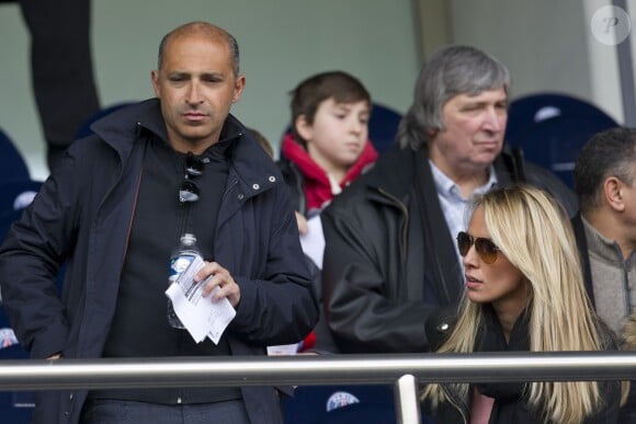 Thomas Fabius et sa compagne - People assistent au match de football Paris Saint-Germain (PSG) contre Lens (RCL) au parc des Princes à Paris le 7 mars 2015, à l'occasion d'un match de la 28e journée de Ligue 1.