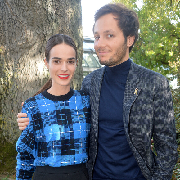 Vianney Bureau (Vianney), sa compagne Catherine Robert - People au défilé Lacoste Collection Prêt-à-Porter Printemps/Eté 2020 lors de la Fashion Week de Paris, le 1er octobre 2019. © Veeren Ramsamy-Christophe Clovis/Bestimage