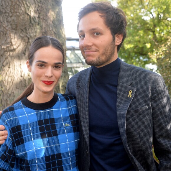 Vianney Bureau (Vianney), sa compagne Catherine Robert - People au défilé Lacoste Collection Prêt-à-Porter Printemps/Eté 2020 lors de la Fashion Week de Paris, le 1er octobre 2019. © Veeren Ramsamy-Christophe Clovis/Bestimage