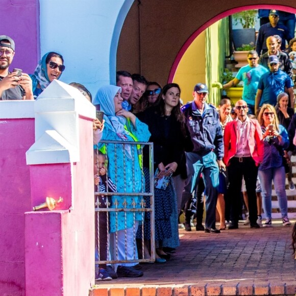 Le prince Harry, duc de Sussex, et Meghan Markle, duchesse de Sussex, lors des célébrations de la fête du patrimoine dans le quartier de Bo Kaap dit "Cape Malay" au Cap, Afrique du Sud, le 24 septembre 2019.