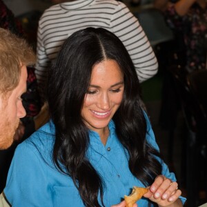 Le prince Harry, duc de Sussex, et Meghan Markle, duchesse de Sussex, visitent le quartier de Bo Kaap dit "Cape Malay" au Cap, Afrique du Sud, le 23 septembre 2019.