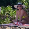 Britney Spears, en bikini jaune, se détend sur une plage de Honolulu, Hawaï, Etats-Unis, le 10 septembre 2019.