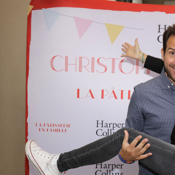 Christophe Michalak et sa femme Delphine McCarty - Sortie du livre de Christophe Michalak "La pâtisserie en famille" à Paris le 9 octobre 2019. © Cédric Perrin/Bestimage