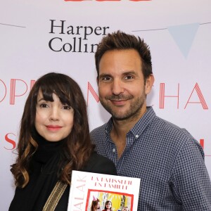 Christophe Michalak et sa femme Delphine McCarty - Sortie du livre de Christophe Michalak "La pâtisserie en famille" à Paris le 9 octobre 2019. © Cédric Perrin/Bestimage