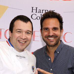 Christophe Michalak et le Chef Guillaume Gomez - Sortie du livre de Christophe Michalak "La pâtisserie en famille" à Paris le 9 octobre 2019. © Cédric Perrin/Bestimage