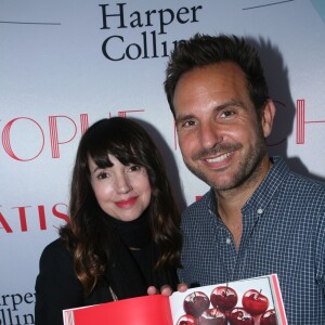 Christophe Michalak et sa femme Delphine McCarty - Sortie du Livre de Christophe Michalak la Patisserie en Famille à Paris le 9 octobre 2019. © JLPPA/Bestimage