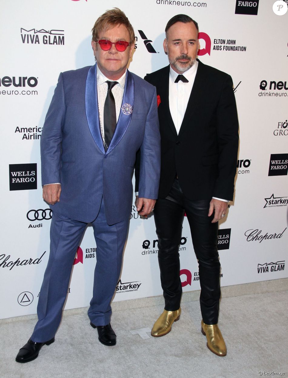 Elton John avec son mari David Furnish lors de la soirée Elton John