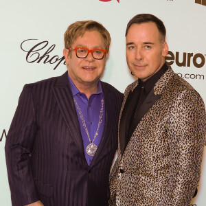 Elton John avec son mari David Furnish à la "Elton John AIDS Foundation Viewing Party" à Los Angeles, le 2 mars 2014.