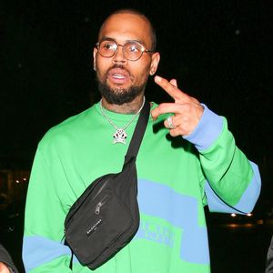 Chris Brown est allé faire la fête avec une jolie inconnue chez Poppy à West Hollywood, le 5 avril 2018