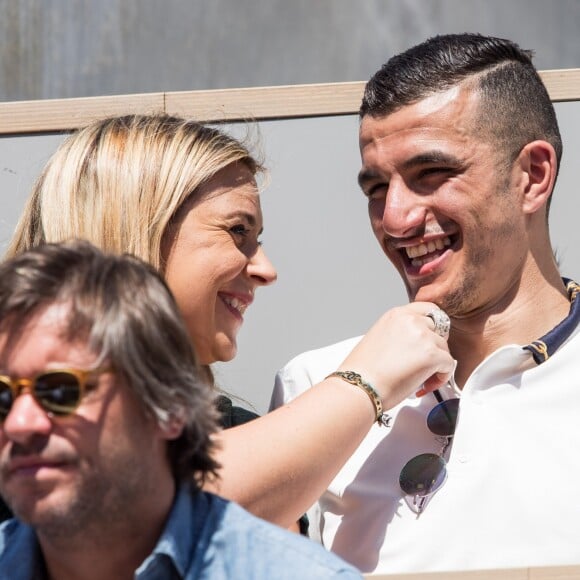 Marion Bartoli et son nouveau compagnon le joueur de football belge Yahya Boumediene dans les tribunes lors des internationaux de tennis de Roland Garros à Paris, France, le 2 juin 2019. © Jacovides-Moreau/Bestimage