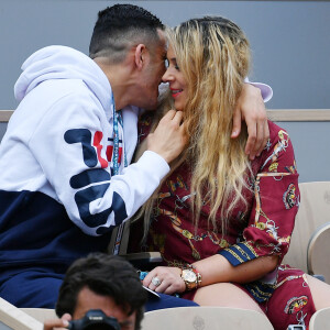 Marion Bartoli et son nouveau compagnon le joueur de football belge Yahya Boumediene s'embrassent dans les tribunes des Internationaux de France de Tennis de Roland Garros à Paris. 22 Mai 2019